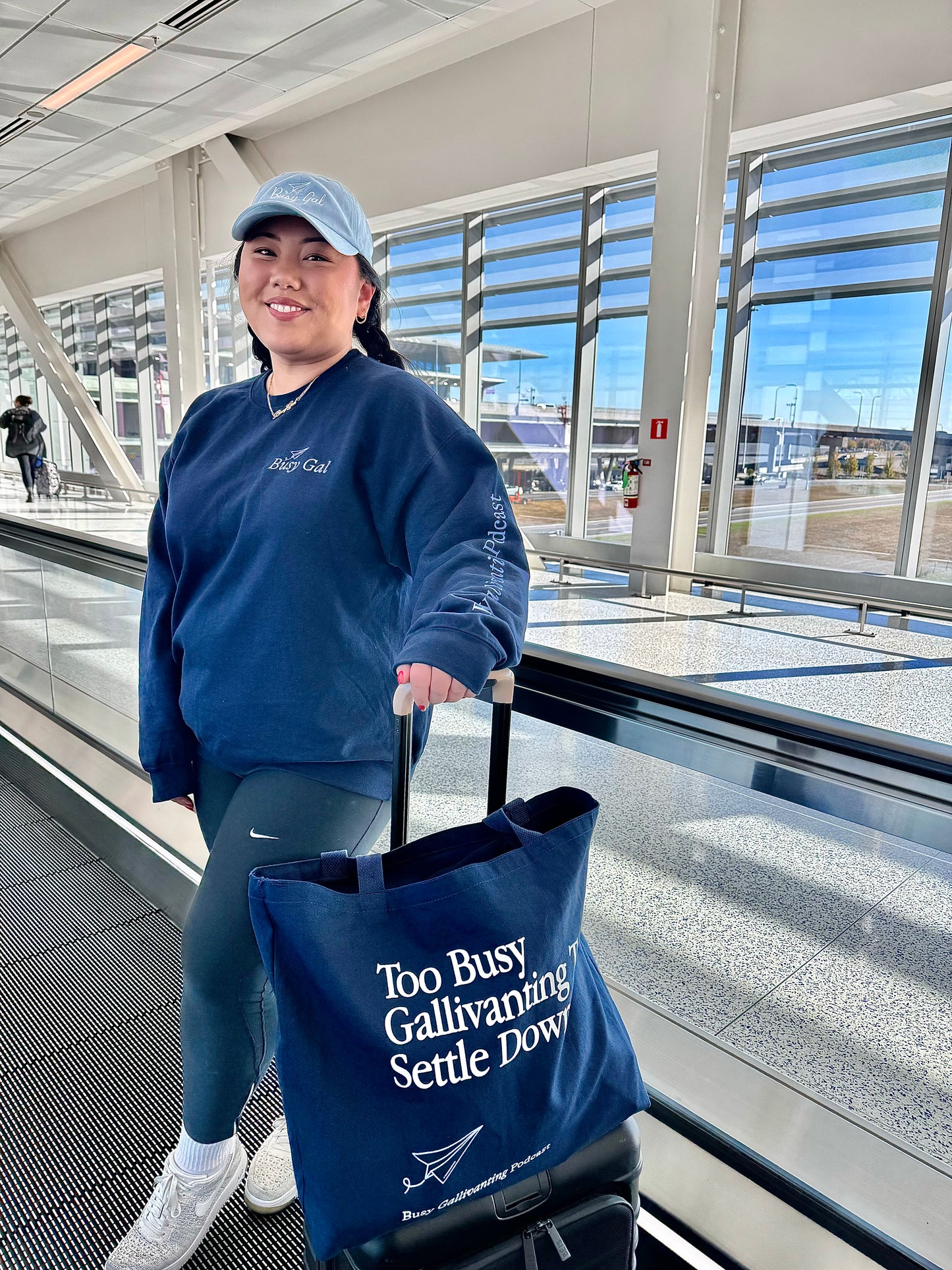 Busy Gal Crewneck navy blue travel sweatshirt for women, soft and cozy, featuring "Busy Gal" graphic on the front